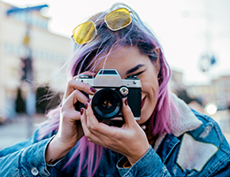 woman holding a camera