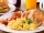 plates of eggs, bacon and biscuits